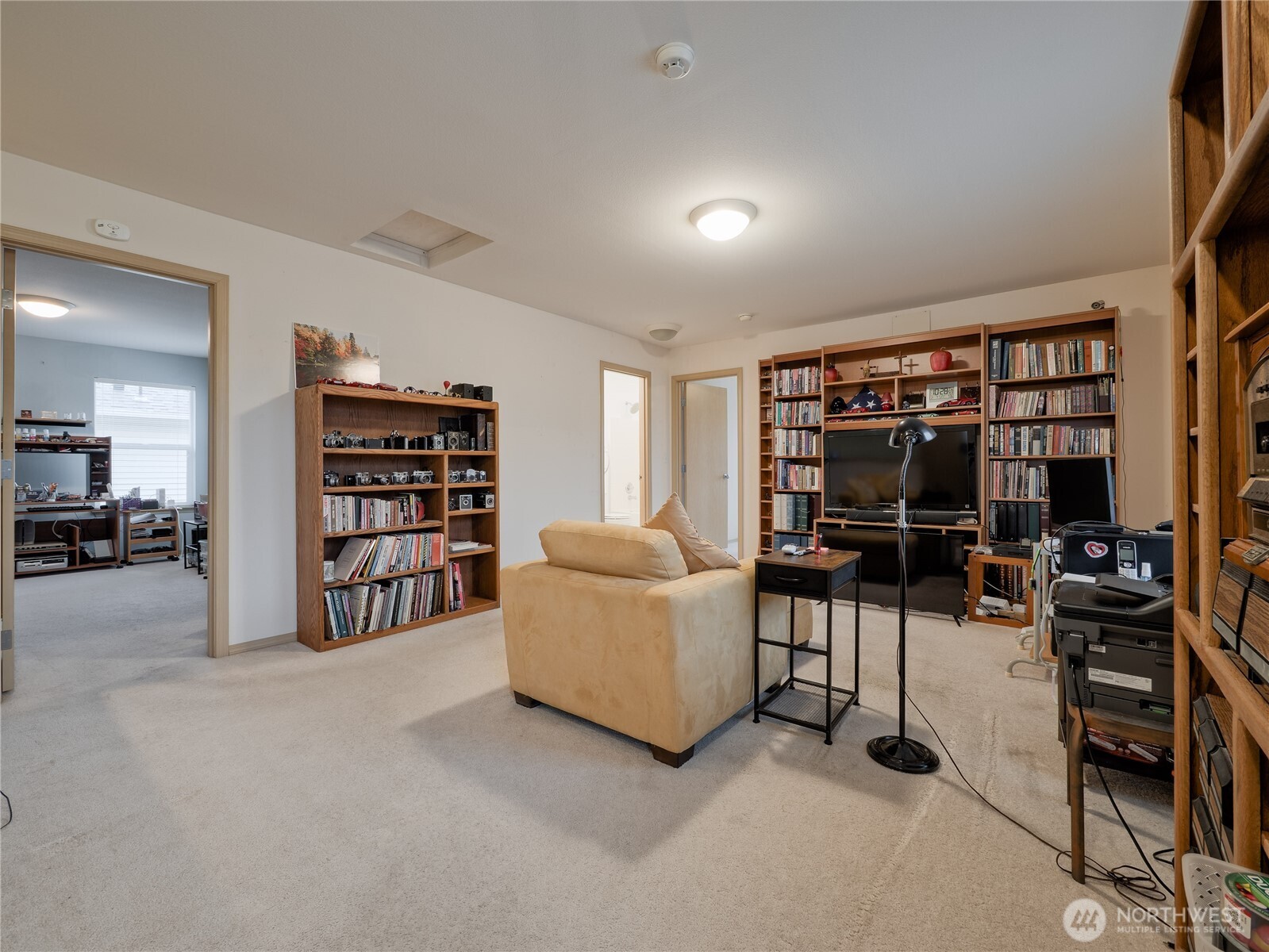 22613 132nd Place Southeast Kent, WA 98042 - Photo 14 of 36 a living room with furniture a walk in closet and a window