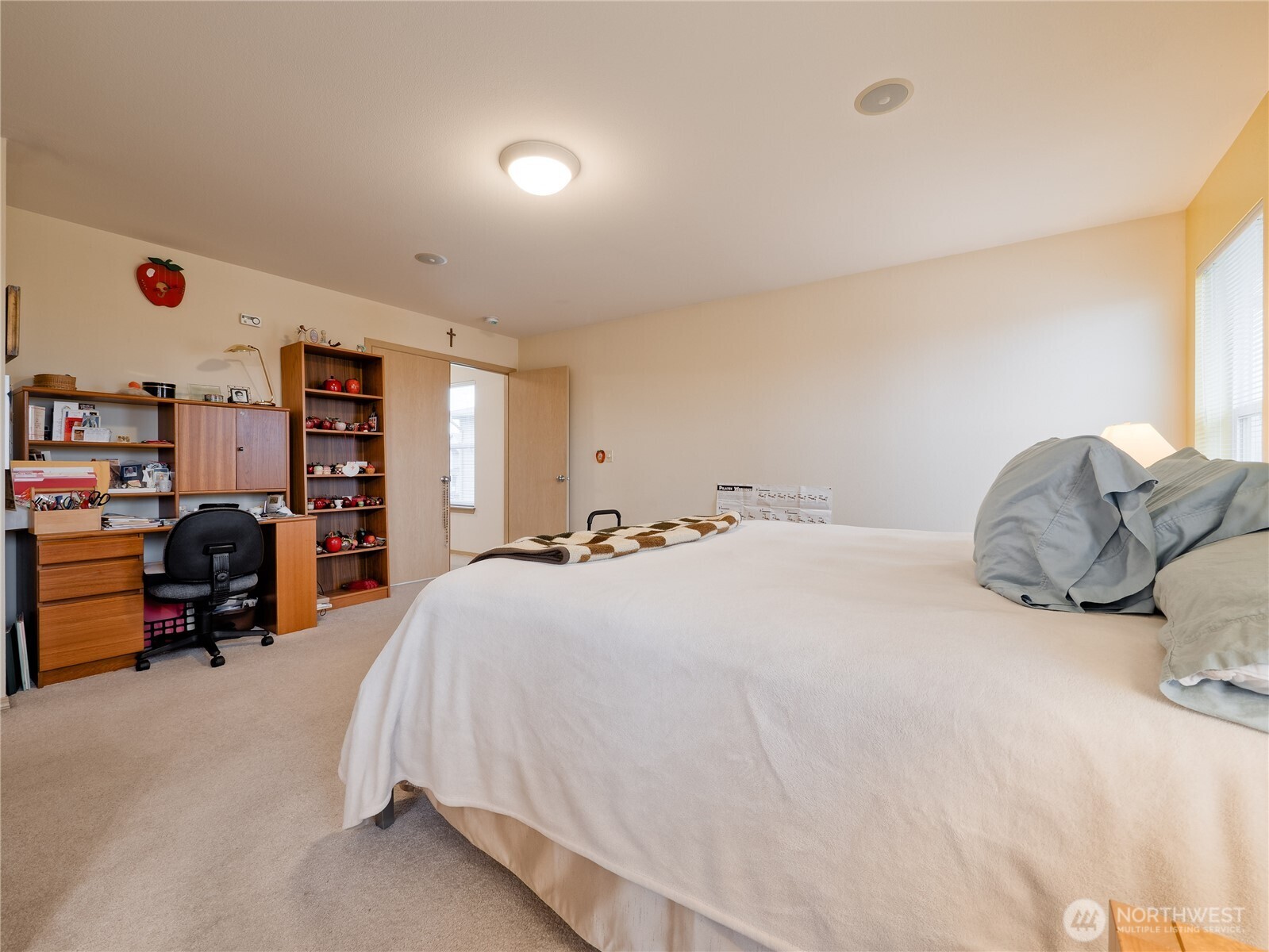 22613 132nd Place Southeast Kent, WA 98042 - Photo 17 of 36 a bedroom with a bed and a large window