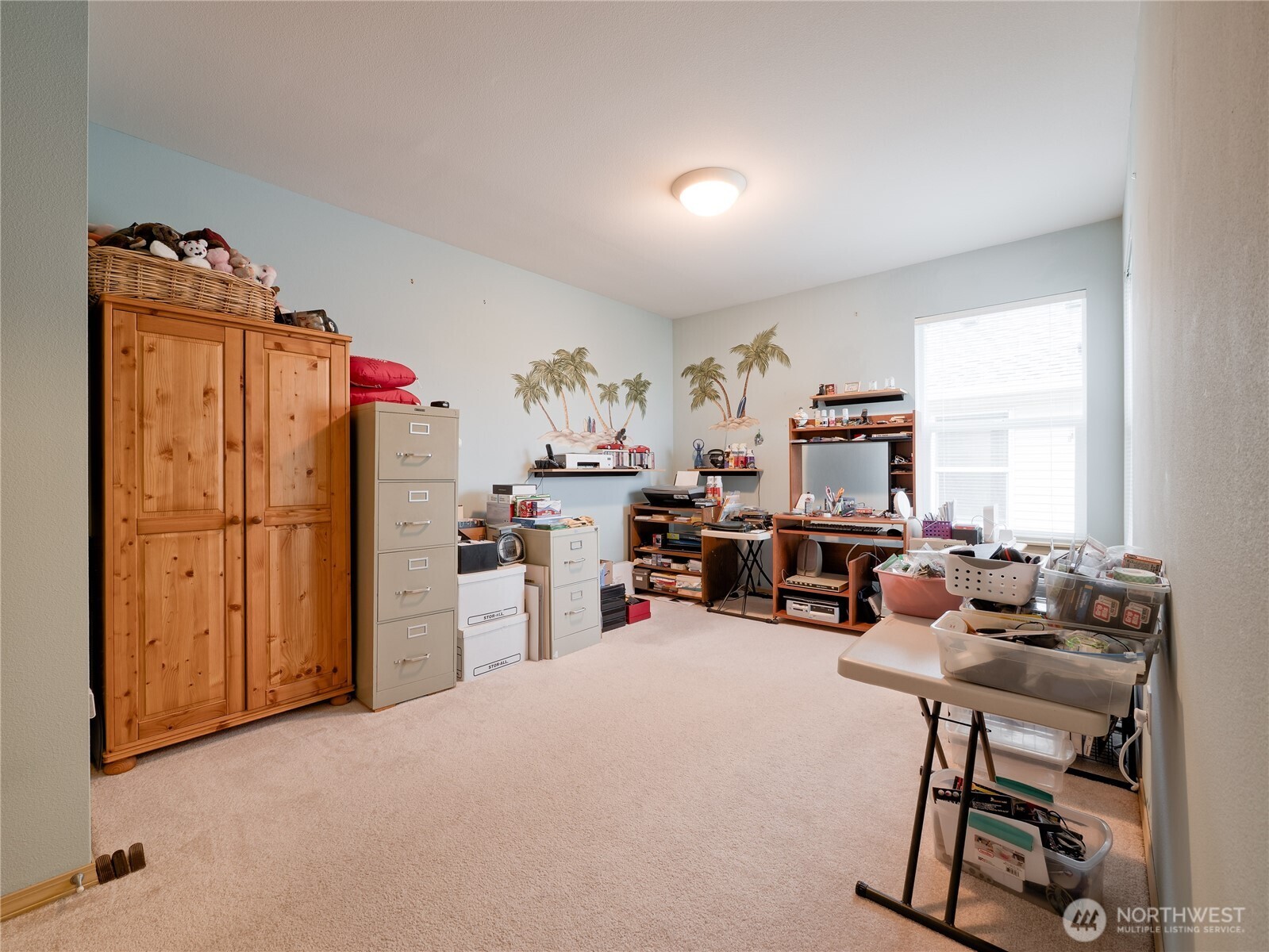 22613 132nd Place Southeast Kent, WA 98042 - Photo 21 of 36 a view of a workspace with furniture and a window