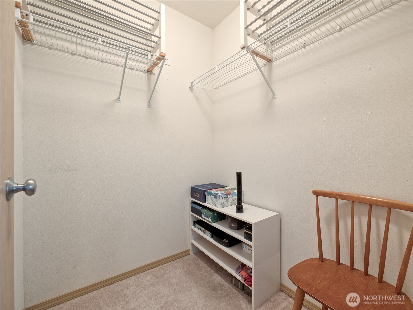 22613 132nd Place Southeast Kent, WA 98042 - Photo 24 of 36 a view of a room with racks on the wall