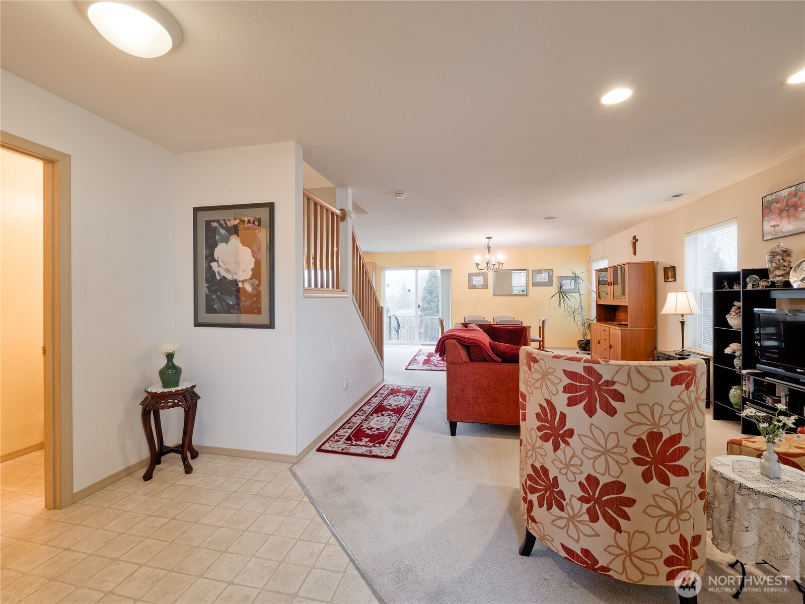 22613 132nd Place Southeast Kent, WA 98042 - Photo 3 of 36 a bed room with furniture and a chandelier
