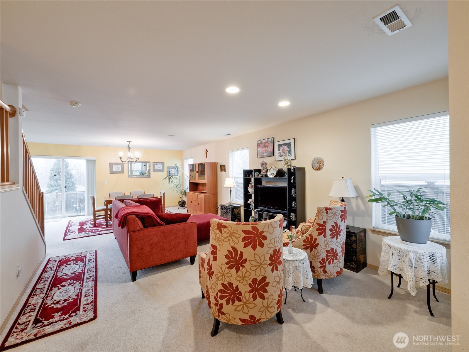 22613 132nd Place Southeast Kent, WA 98042 - Photo 4 of 36 a living room with furniture and a flat screen tv