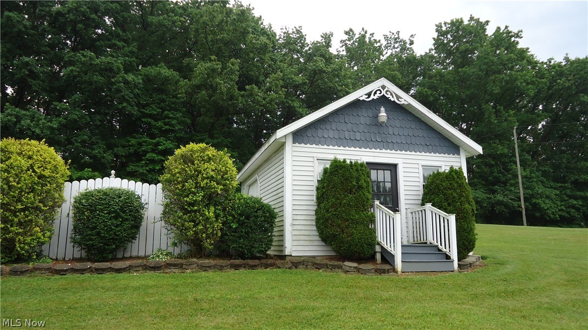11720 Walker Road Minerva, OH 44657 - Photo 17 of 21 nice sized shed for pool equipment, lawn tools etc, has a pull down for extra storage above