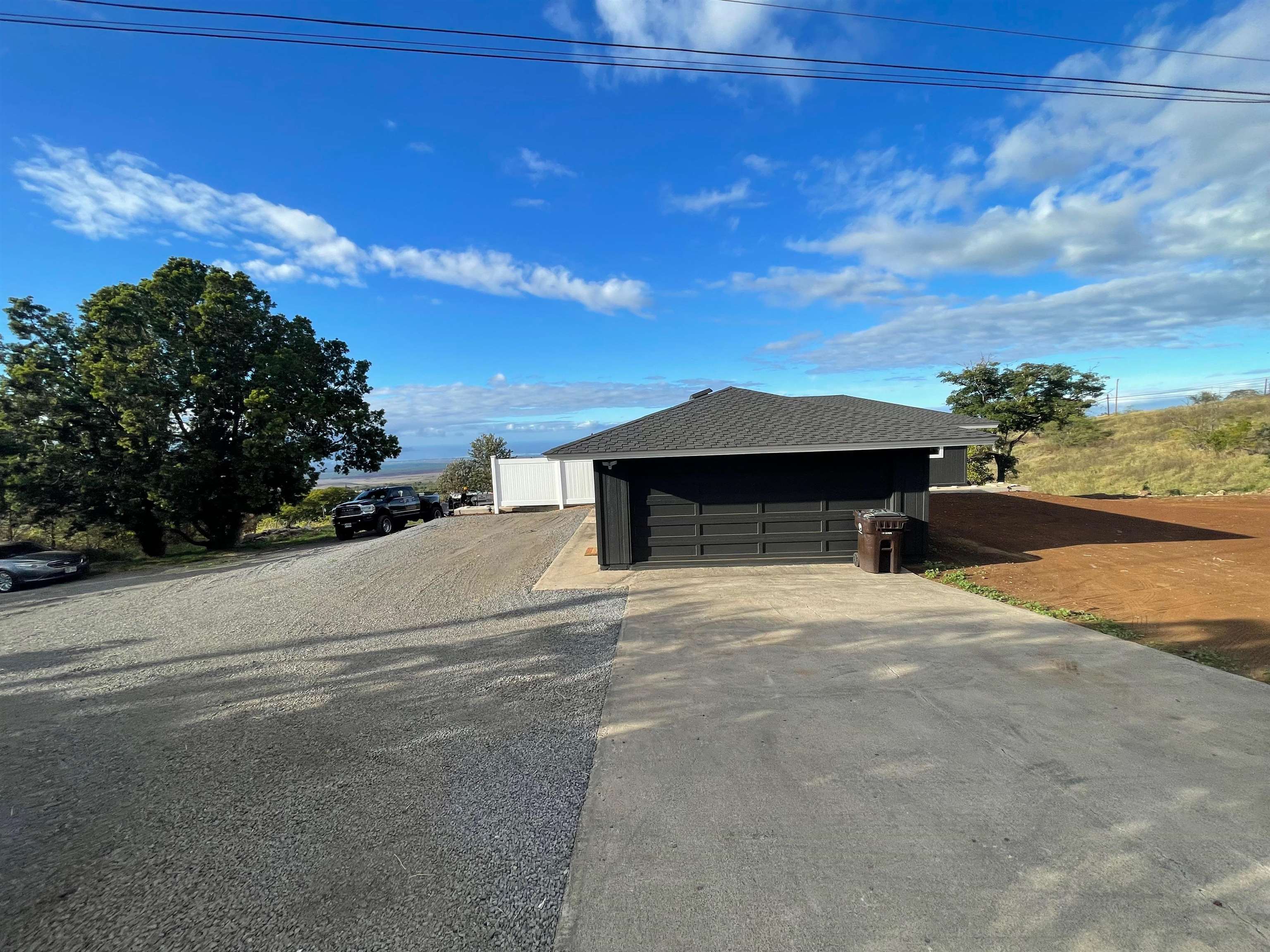 2 Omaopio Road, Unit 2 Kula, HI 96790 - Photo 3 of 8 a view of a house with a yard