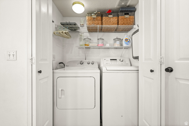 174 Rockey Park Lane, Unit 34 Draper, UT 84020 - Photo 18 of 20 Laundry area with separate washer and dryer