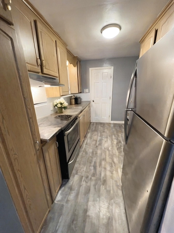 3 Delaney Avenue Dudley, MA 01571 - Photo 2 of 14 a kitchen with granite countertop a sink stove and refrigerator