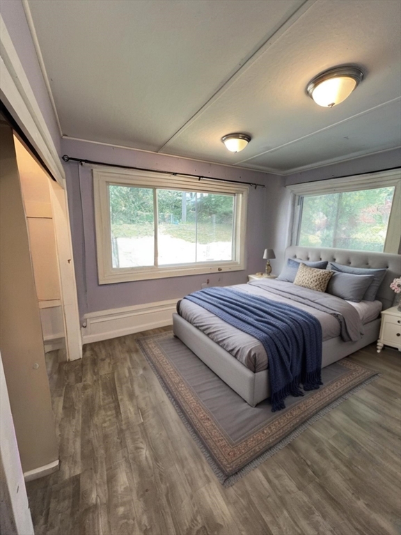 3 Delaney Avenue Dudley, MA 01571 - Photo 9 of 14 a spacious bedroom with a bed and large windows