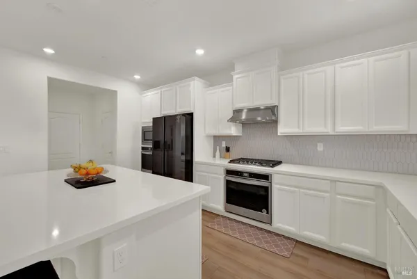 a workspace with furniture and wooden floor