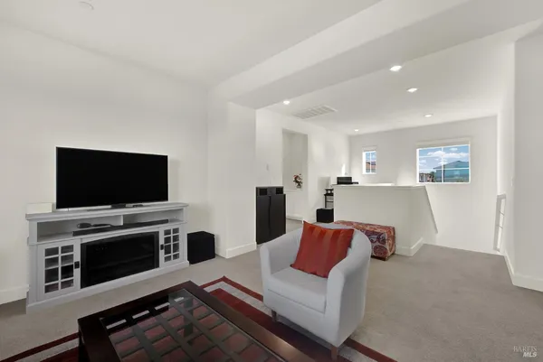 a large bathroom with a double vanity sink and a large mirror