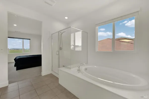 a view of a city with an ocean view