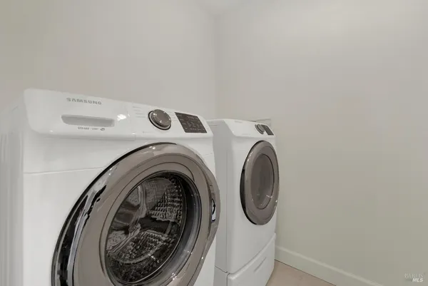 a living room with furniture and a garden