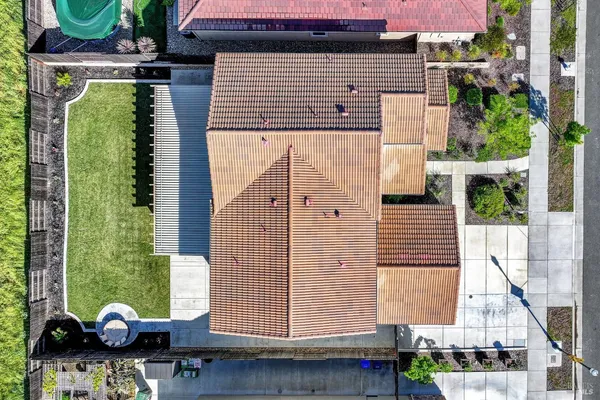 a view of a backyard with sitting area