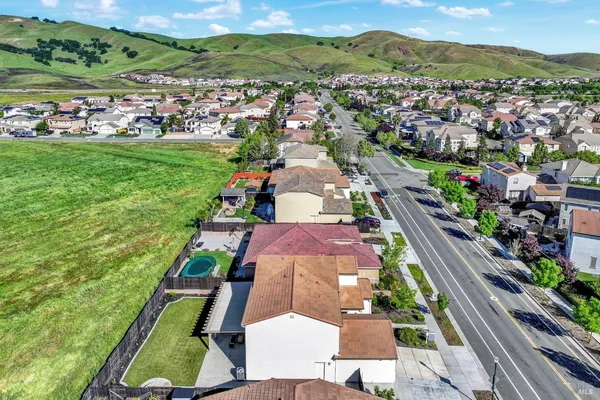 a view of a swimming pool and an outdoor seating