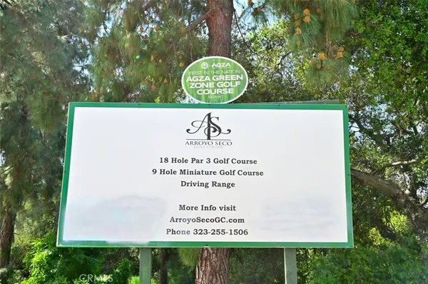 a front view of a house with garage