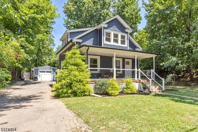 a house with trees in the background