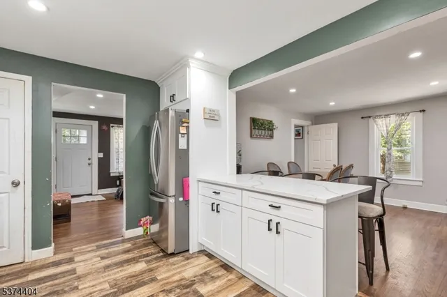 a view of a kitchen counter space and windows
