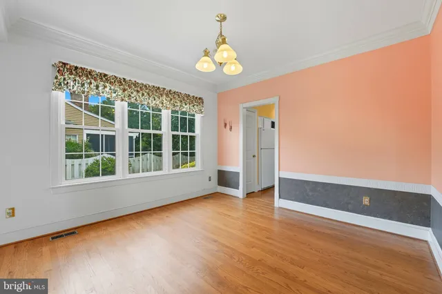 a kitchen with a sink and a window