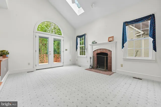 an empty room with closet area