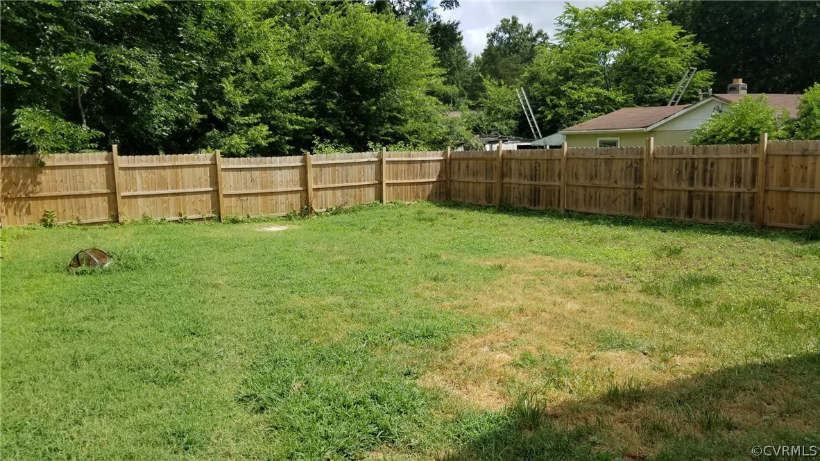 2816 Congress Road North Chesterfield, VA 23237 - Photo 3 of 12 a view of a backyard with grass and plants