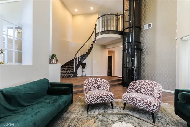 a view of entryway with wooden floor