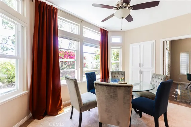 a kitchen with granite countertop a sink stainless steel appliances and cabinets