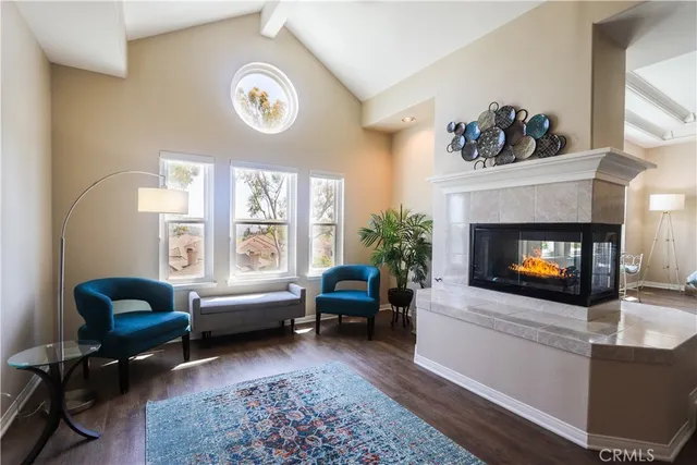 a spacious bathroom with double vanity and a large mirror