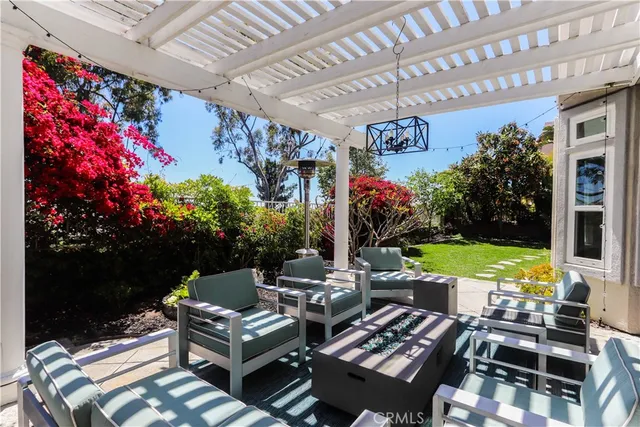 a view of a chairs and table in a patio