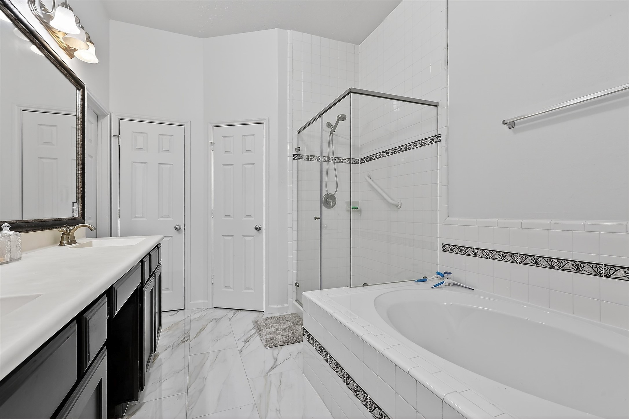 12432 Tyler Springs Lane Humble, TX 77346 - Photo 13 of 25 Primary Bath with granite countertops