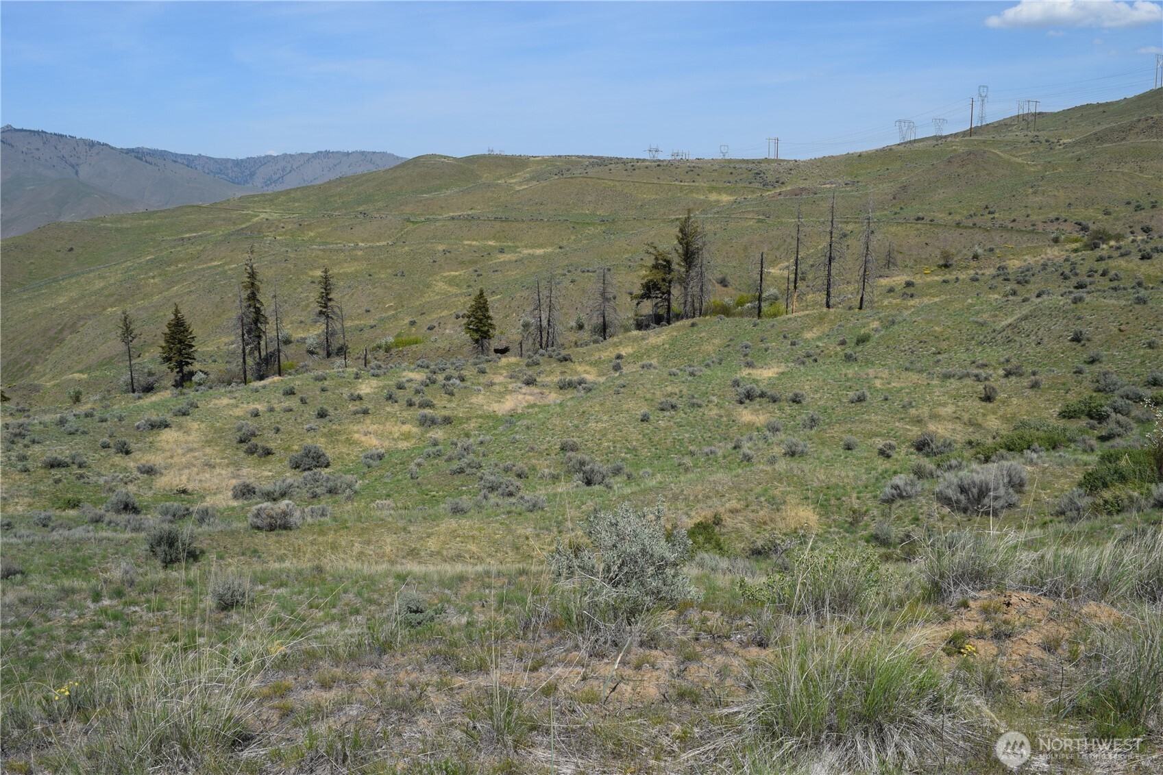 a view of a mountain with an outdoor space