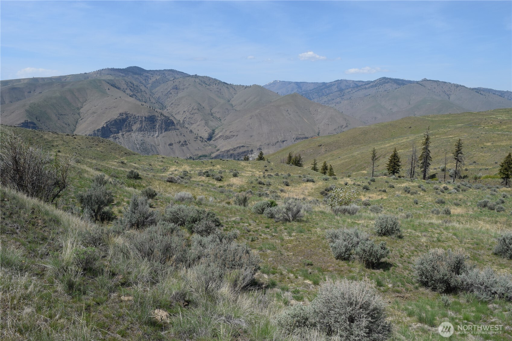 8 Blue Grade Road East Wenatchee, WA 98802 - Photo 5 of 11 a view of a mountain with an outdoor space