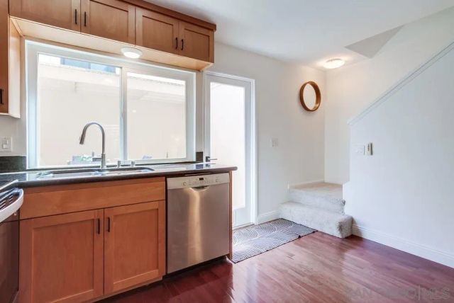 a view of a sink and a mirror