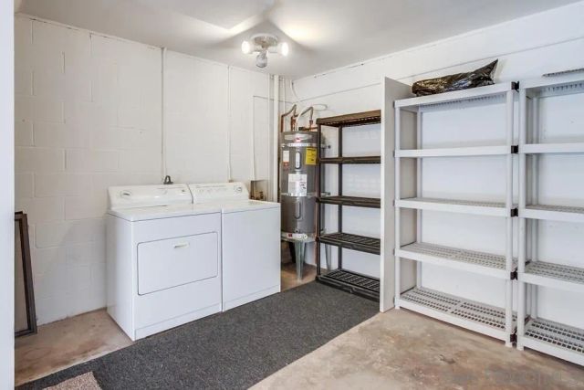 a view of a hallway with wooden floor and closet