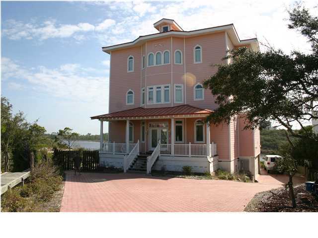 249 Old Beach Road Santa Rosa Beach, FL 32459 - Photo 5 of 16 a front view of a house with yard