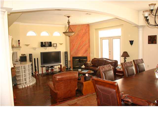 249 Old Beach Road Santa Rosa Beach, FL 32459 - Photo 7 of 16 a living room with furniture and a flat screen tv