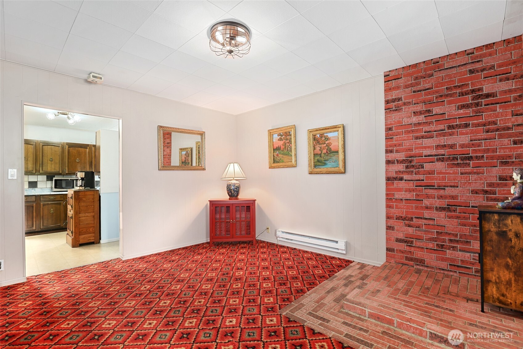 215 H Street Cosmopolis, WA 98537 - Photo 12 of 40 a bedroom with a bed and a television