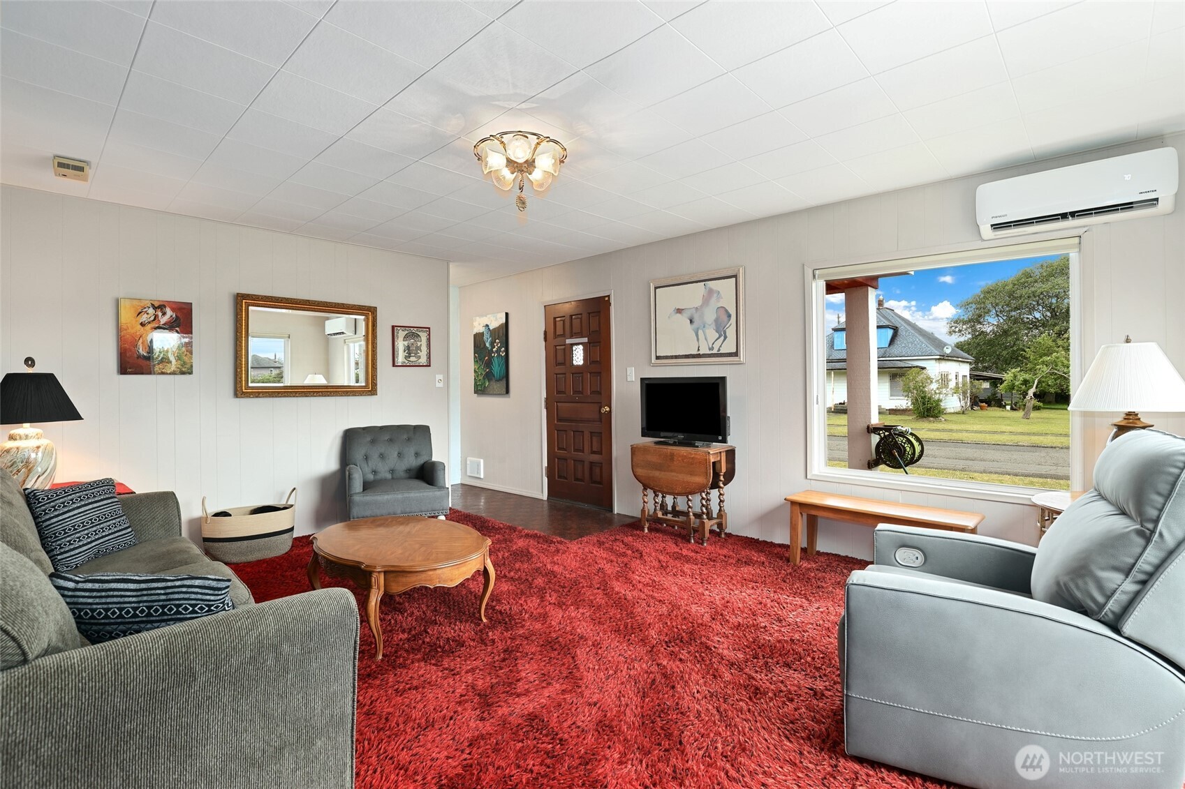 215 H Street Cosmopolis, WA 98537 - Photo 14 of 40 a living room with furniture and a flat screen tv