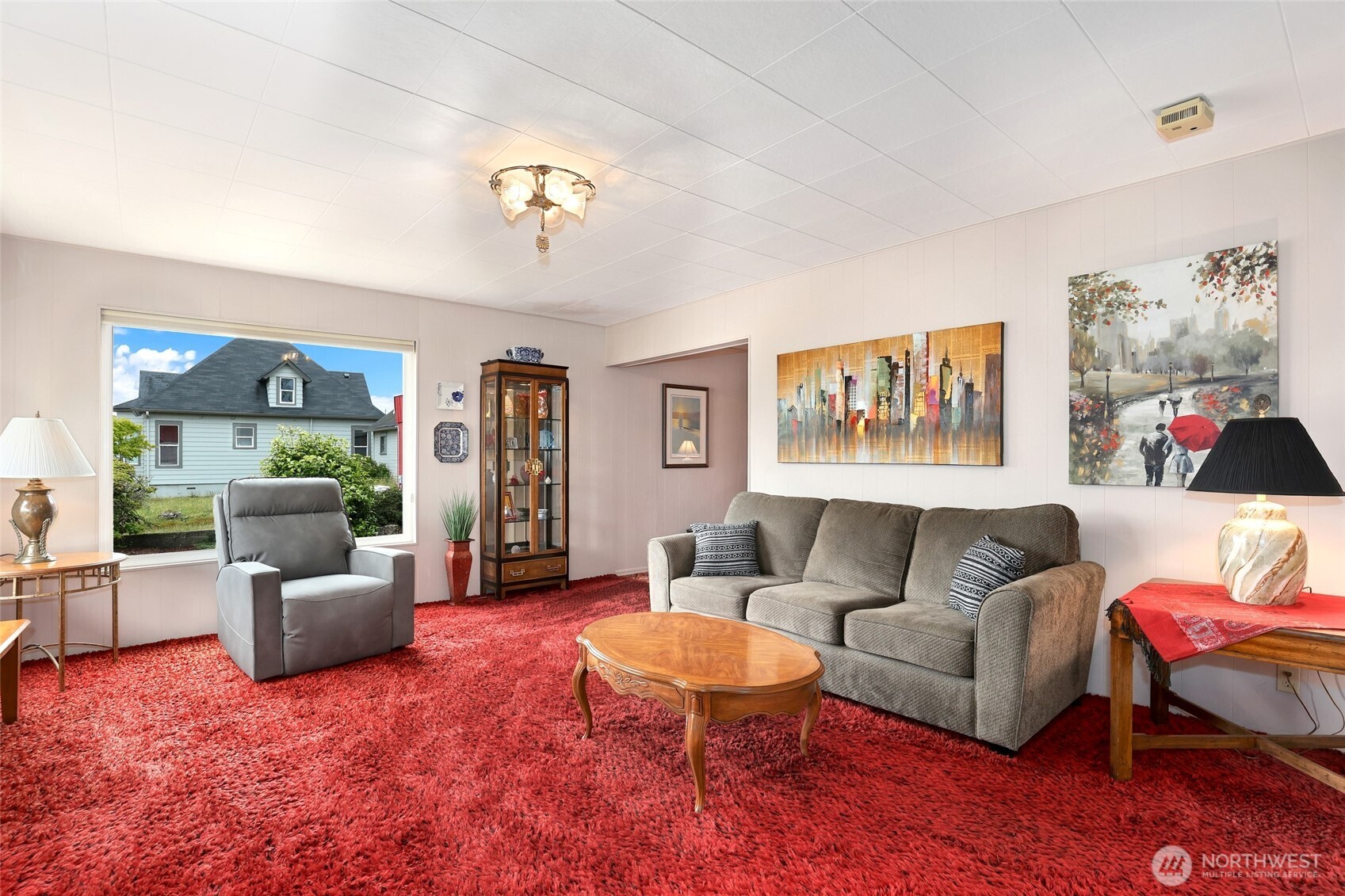 215 H Street Cosmopolis, WA 98537 - Photo 15 of 40 a living room with furniture and a wooden floor