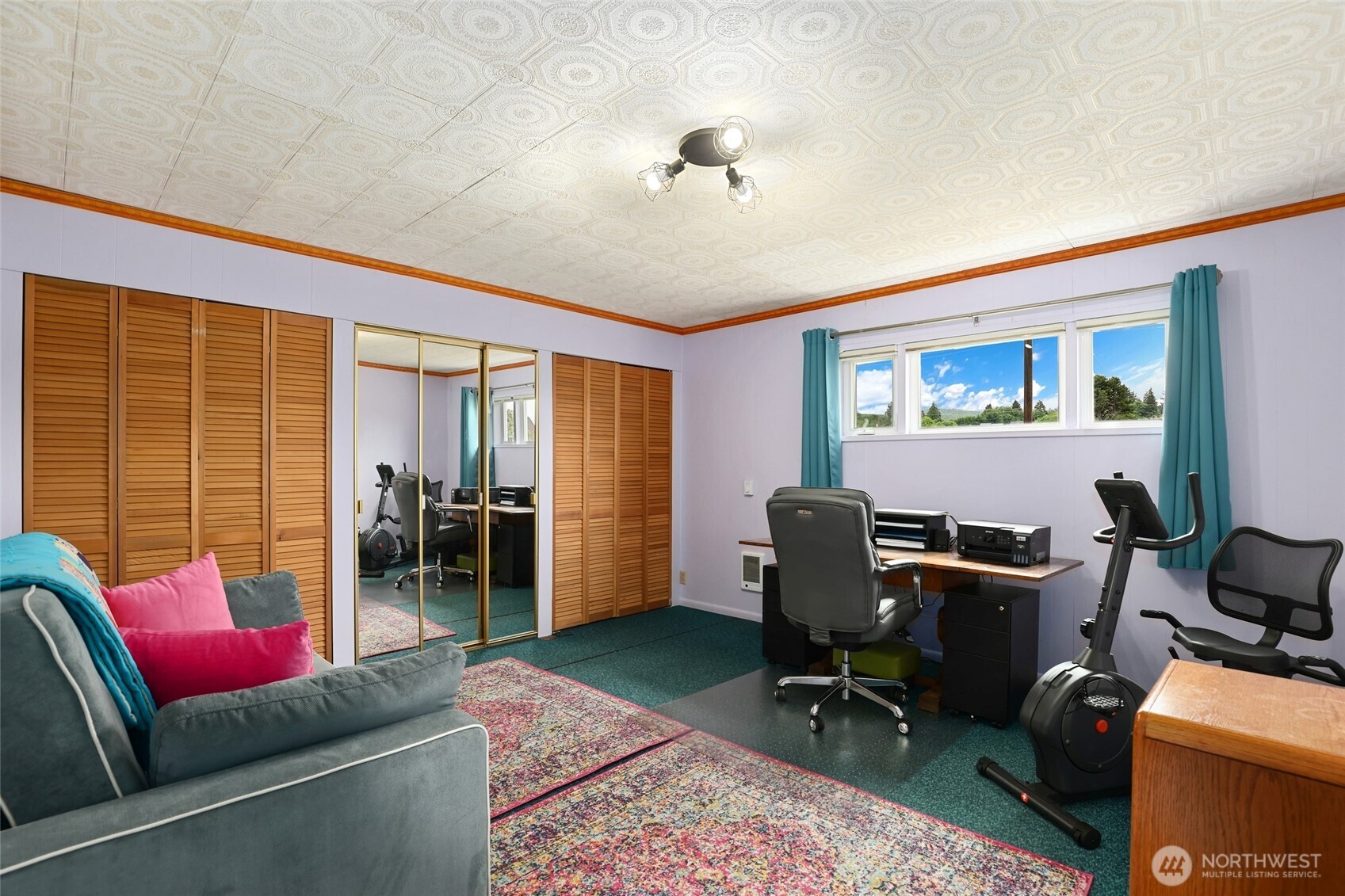 215 H Street Cosmopolis, WA 98537 - Photo 25 of 40 a living room with furniture and a flat screen tv