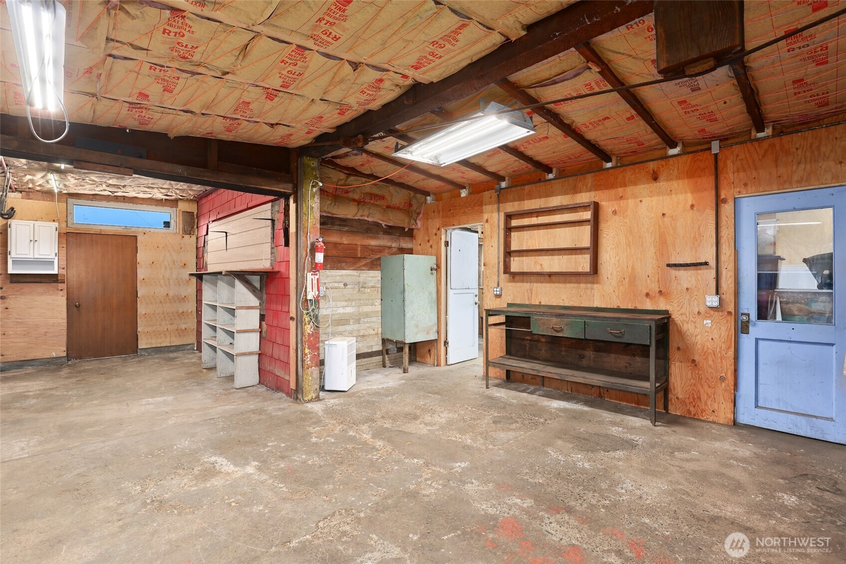 215 H Street Cosmopolis, WA 98537 - Photo 31 of 40 a view of an empty room with furniture and a window