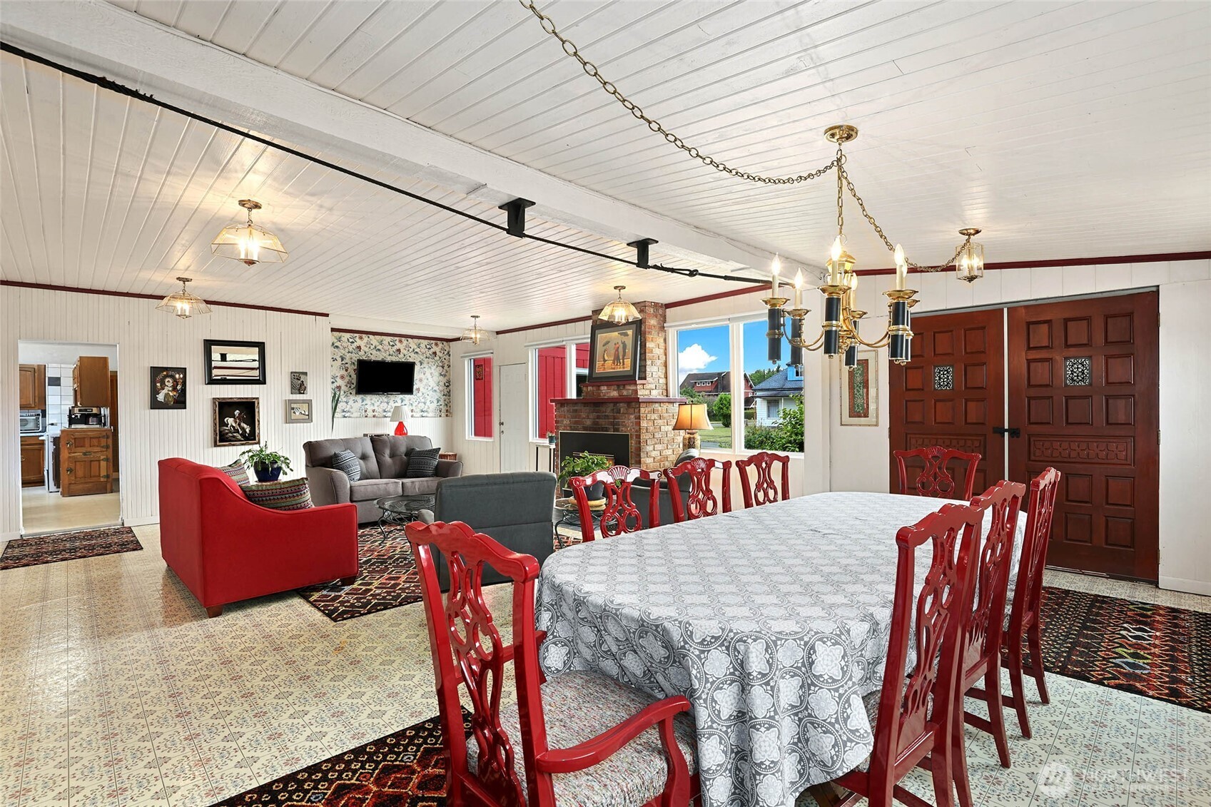 215 H Street Cosmopolis, WA 98537 - Photo 6 of 40 a view of a dining room with furniture wooden floor and chandelier