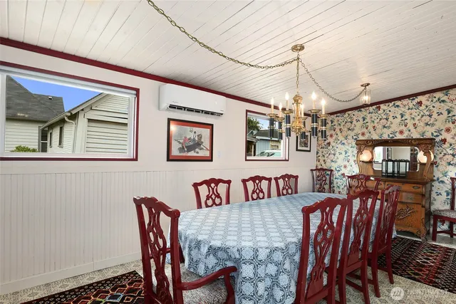 a view of a dining room with furniture