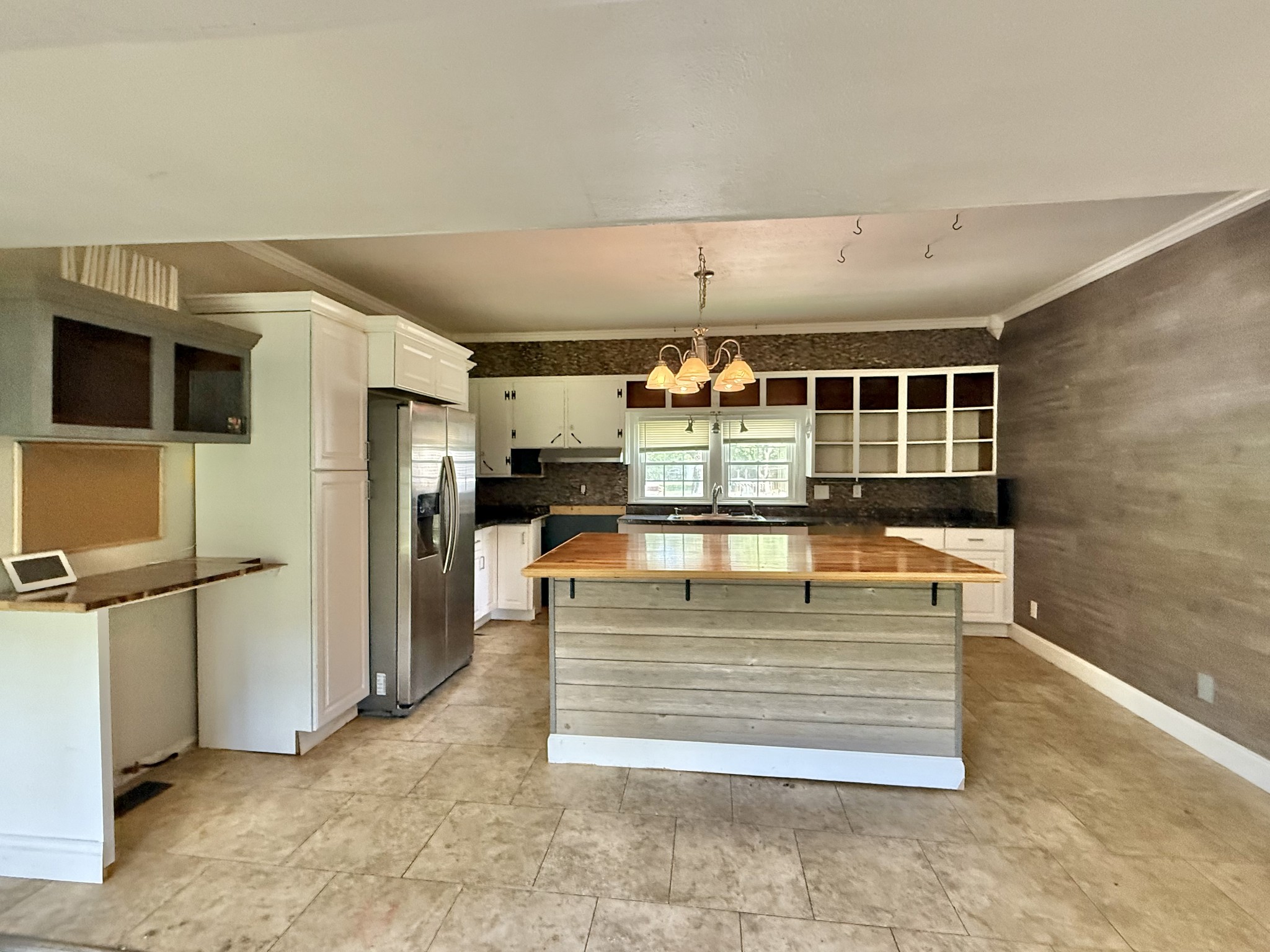 604 South Main Street St. Joseph, TN 38481 - Photo 4 of 10 a view of kitchen with refrigerator and window