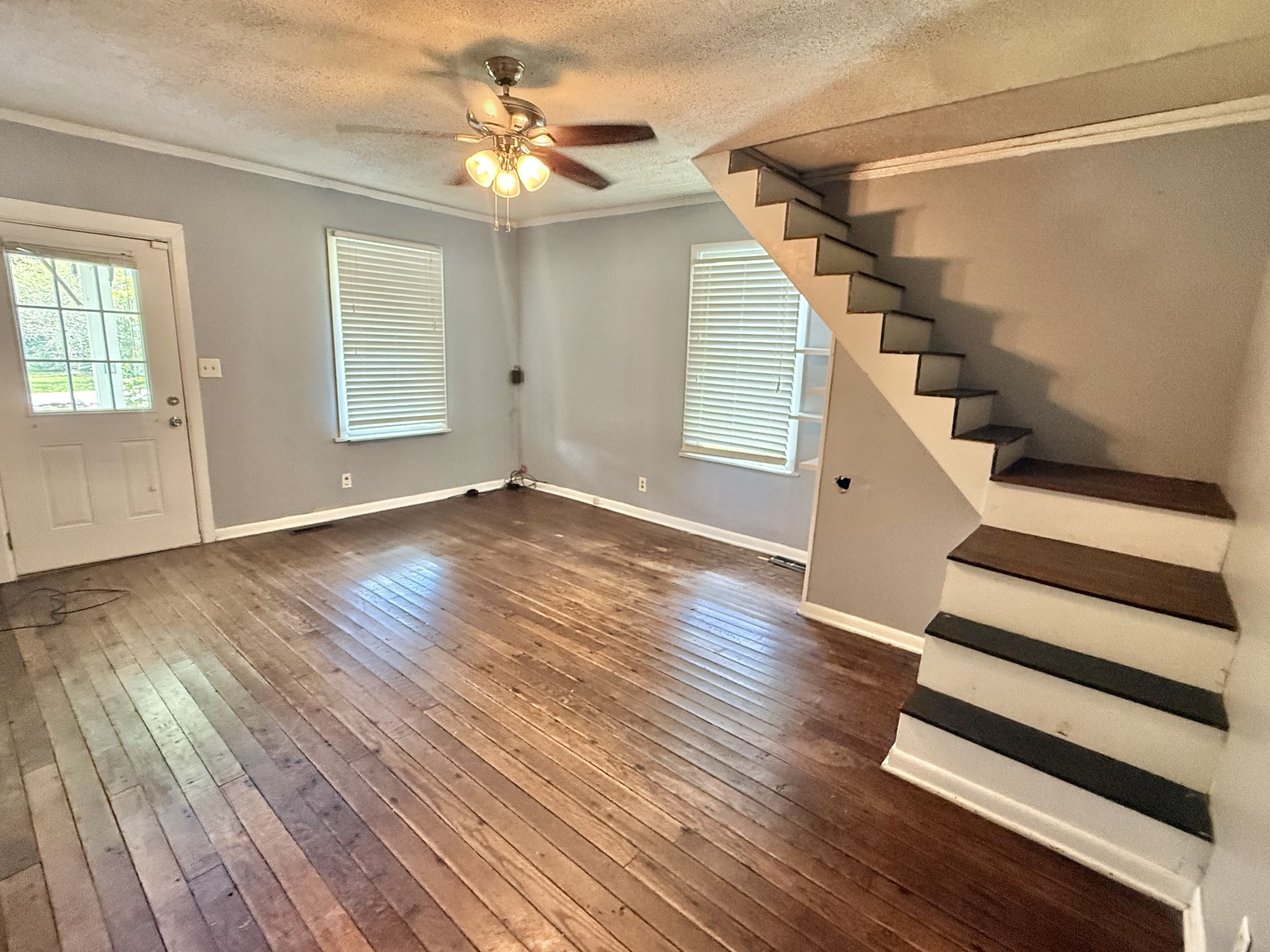604 South Main Street St. Joseph, TN 38481 - Photo 6 of 10 wooden floor in an empty room with a window
