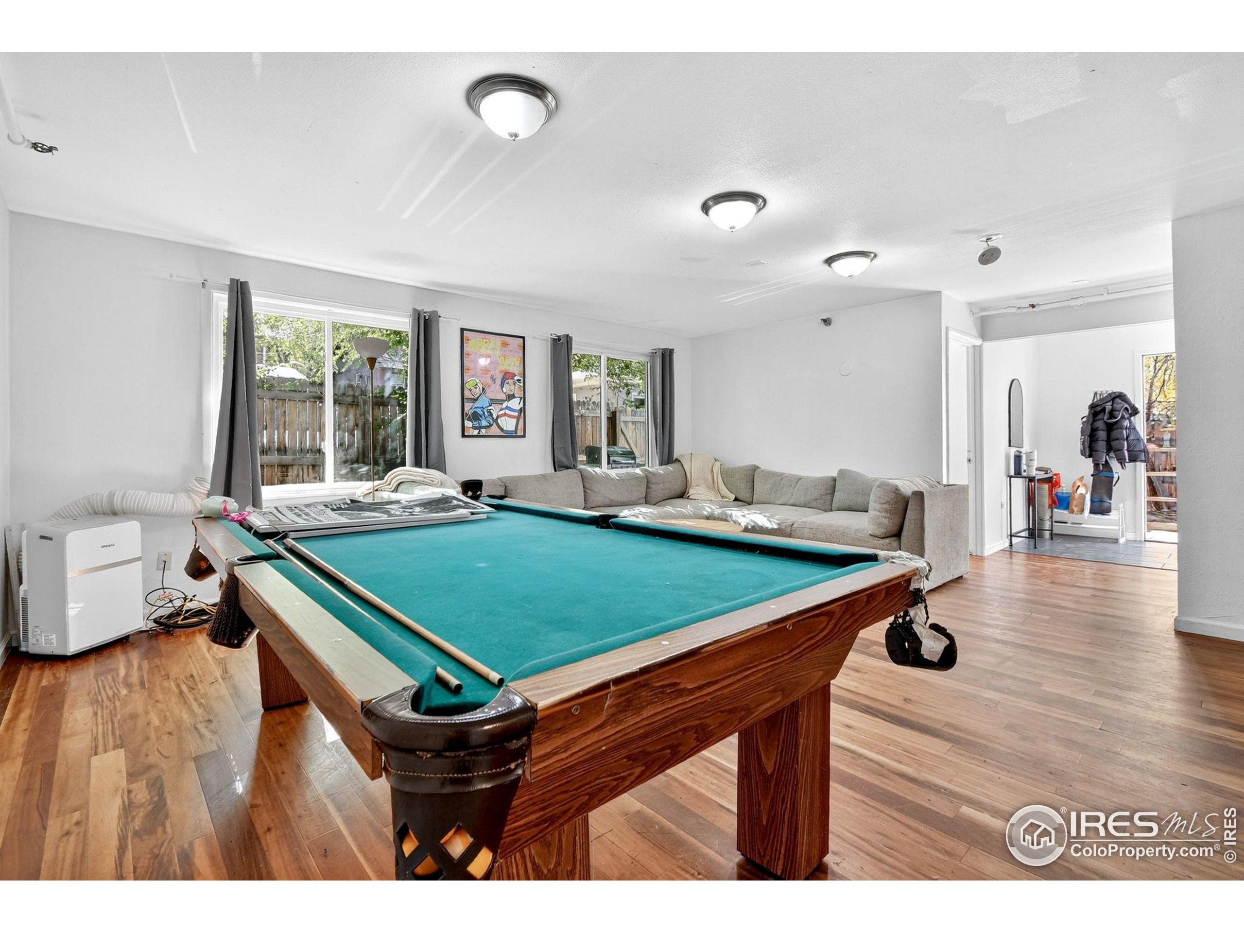 972 Pleasant Street Boulder, CO 80302 - Photo 15 of 36 a room with pool table and windows