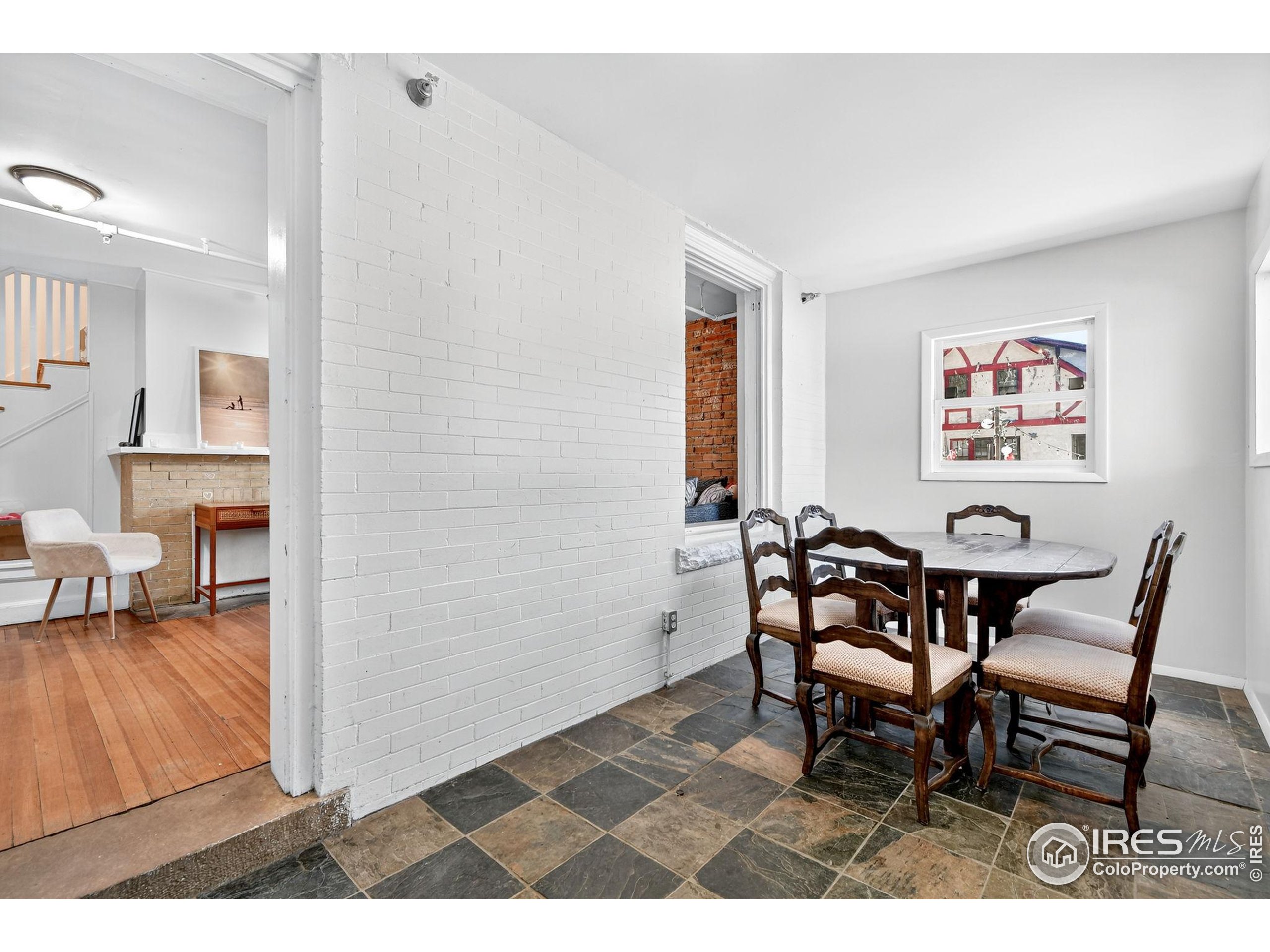 972 Pleasant Street Boulder, CO 80302 - Photo 2 of 36 a view of a dining room with furniture