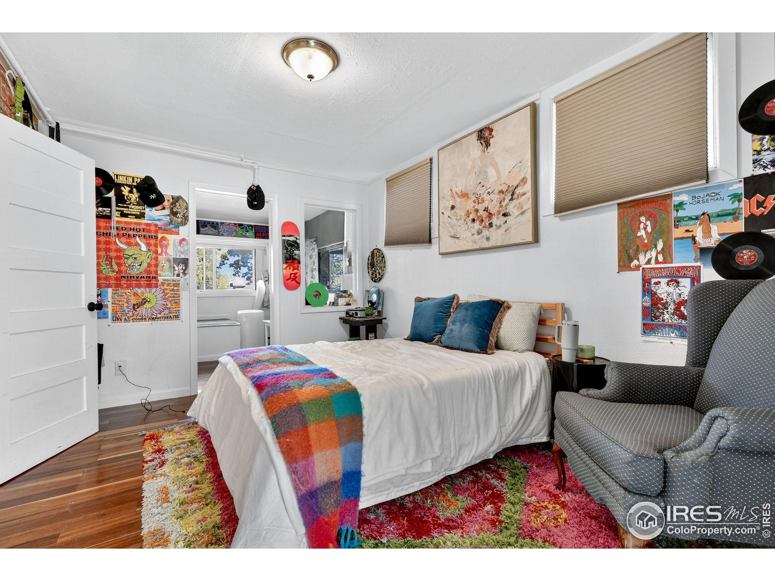 972 Pleasant Street Boulder, CO 80302 - Photo 26 of 36 a bedroom with a bed and a couch