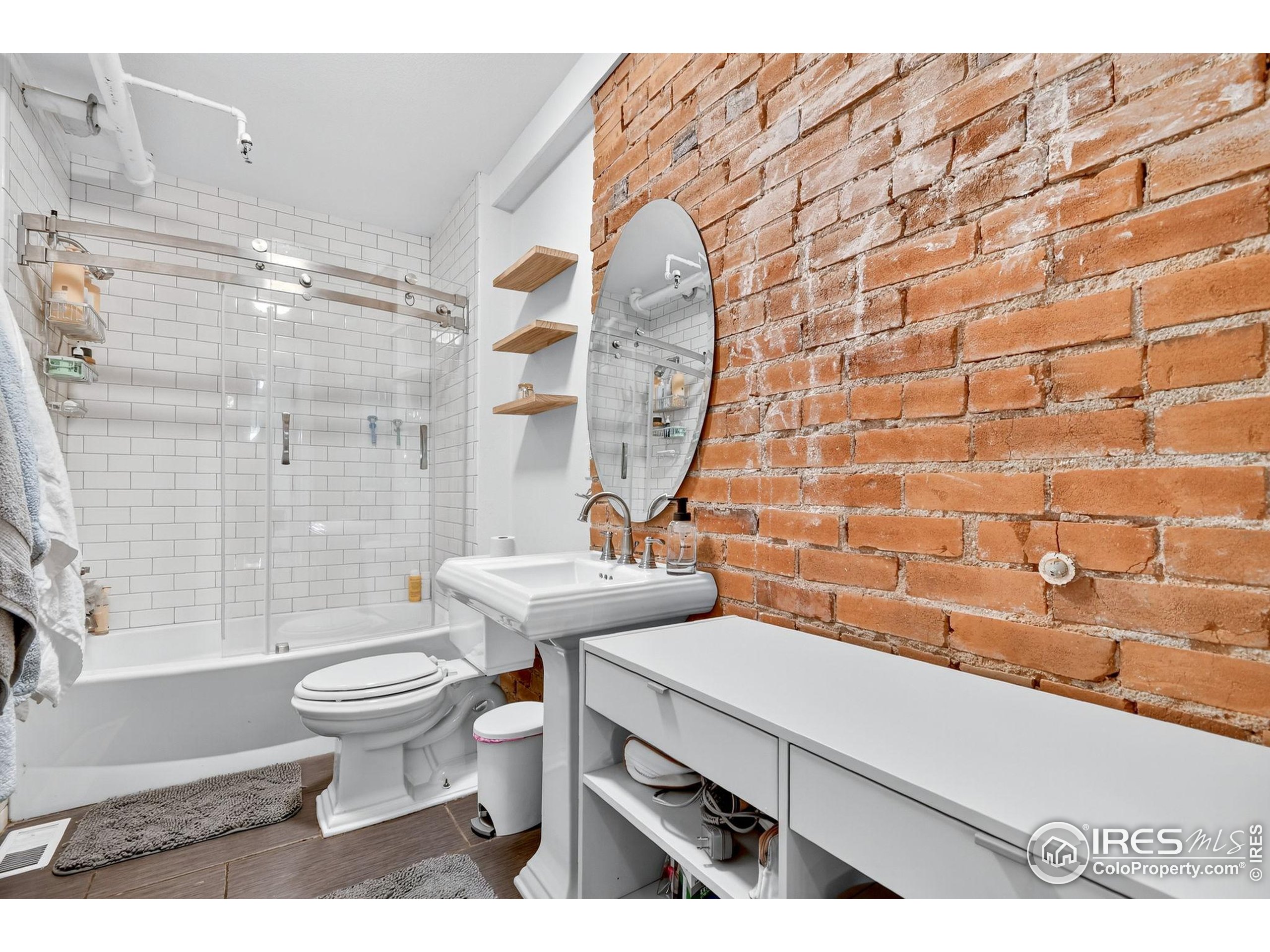 972 Pleasant Street Boulder, CO 80302 - Photo 28 of 36 a bathroom with a sink toilet and shower