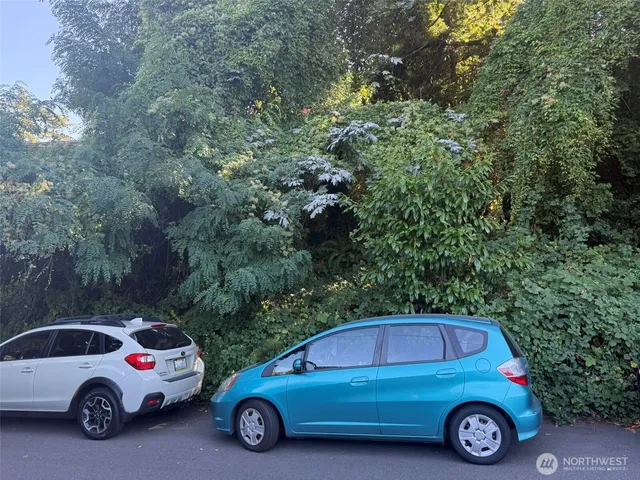a car parked in front of a house