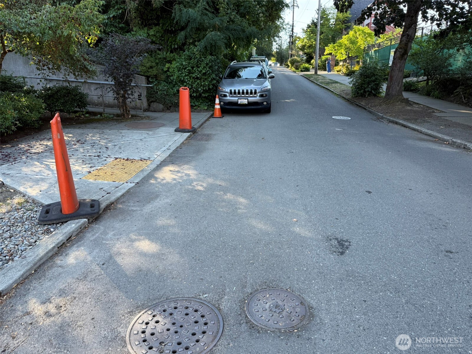0 East Howell Street Seattle, WA 98122 - Photo 8 of 8 a play ground with potted plants and barbeque oven