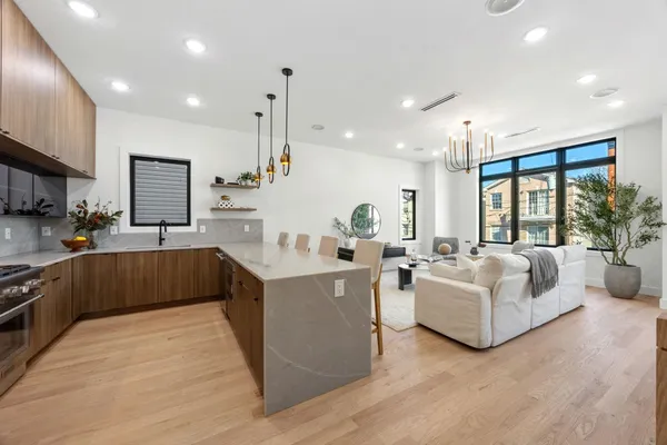 a bedroom with a bed and a mirror